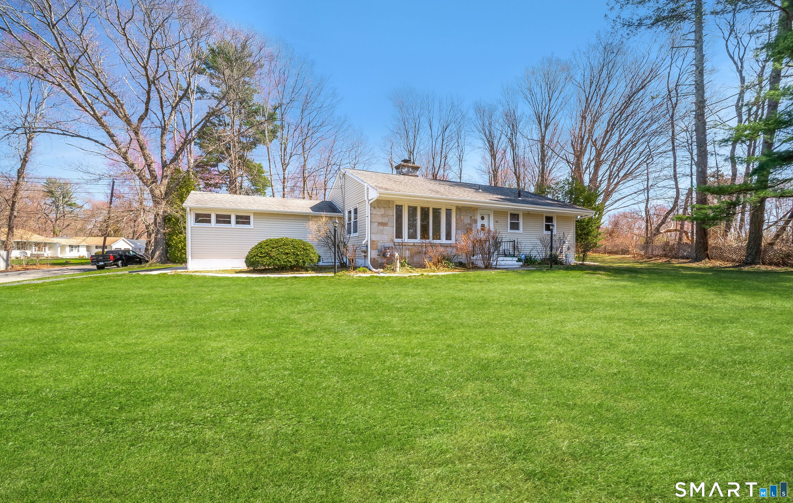 16 Featherbed Lane Branford, CT 06405 - Photo 31 of 40 a view of house in front of a big yard with large trees