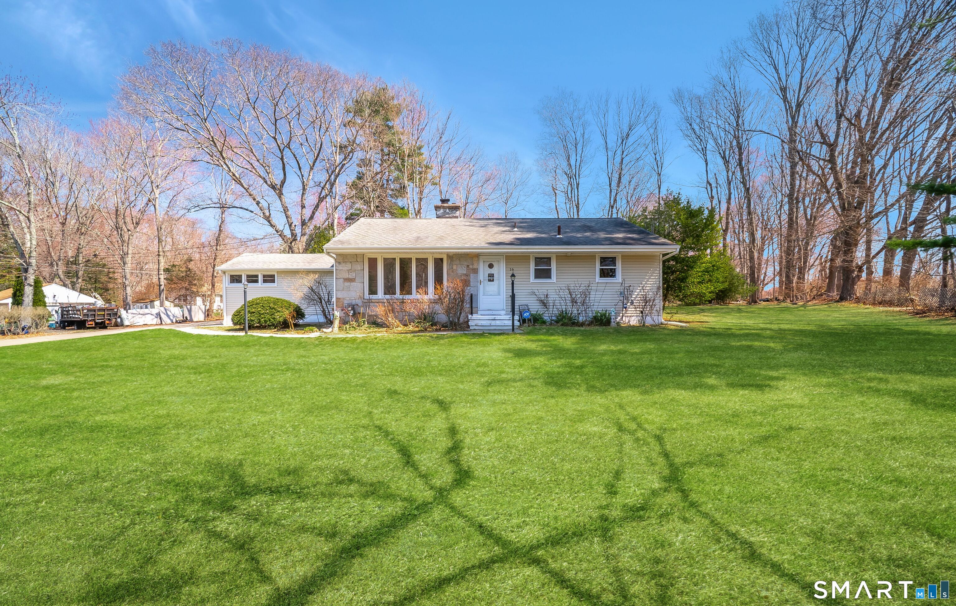 16 Featherbed Lane Branford, CT 06405 - Photo 32 of 40 a view of a house with a big yard and large trees