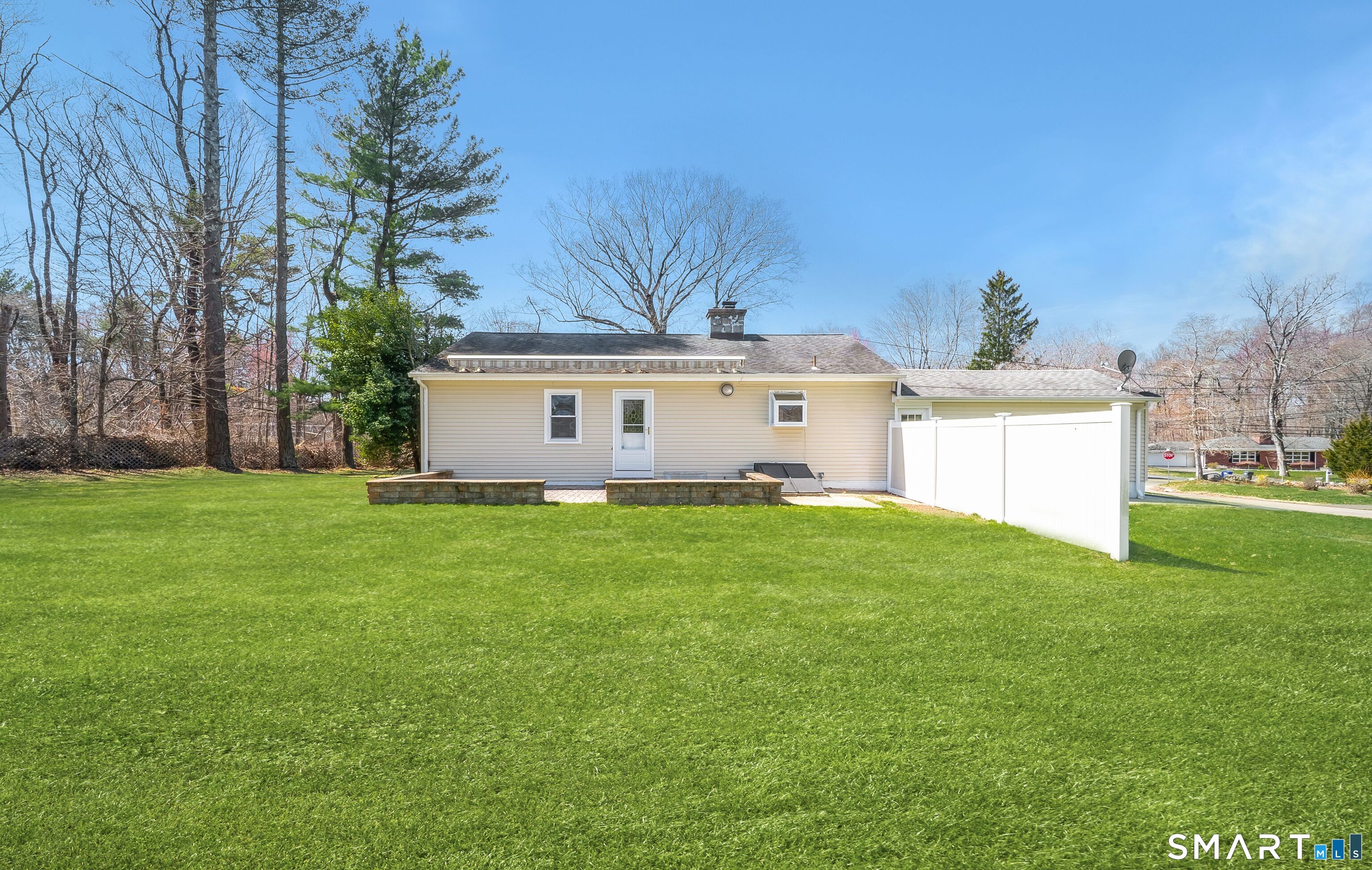 16 Featherbed Lane Branford, CT 06405 - Photo 36 of 40 a view of a house with a back yard