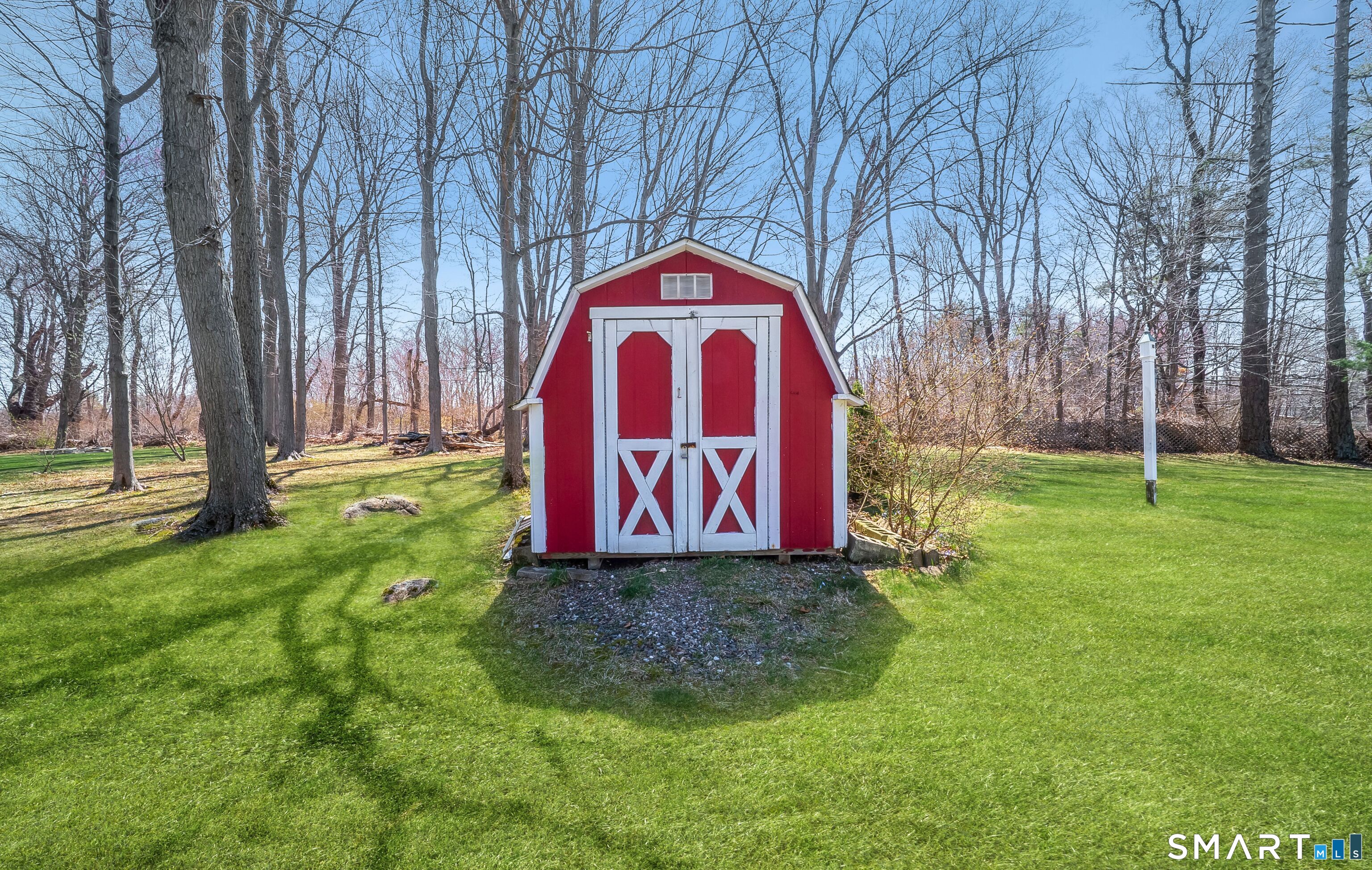 16 Featherbed Lane Branford, CT 06405 - Photo 38 of 40 a sign that is sitting in the grass