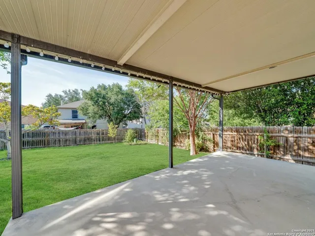 a view of a porch with a big yard
