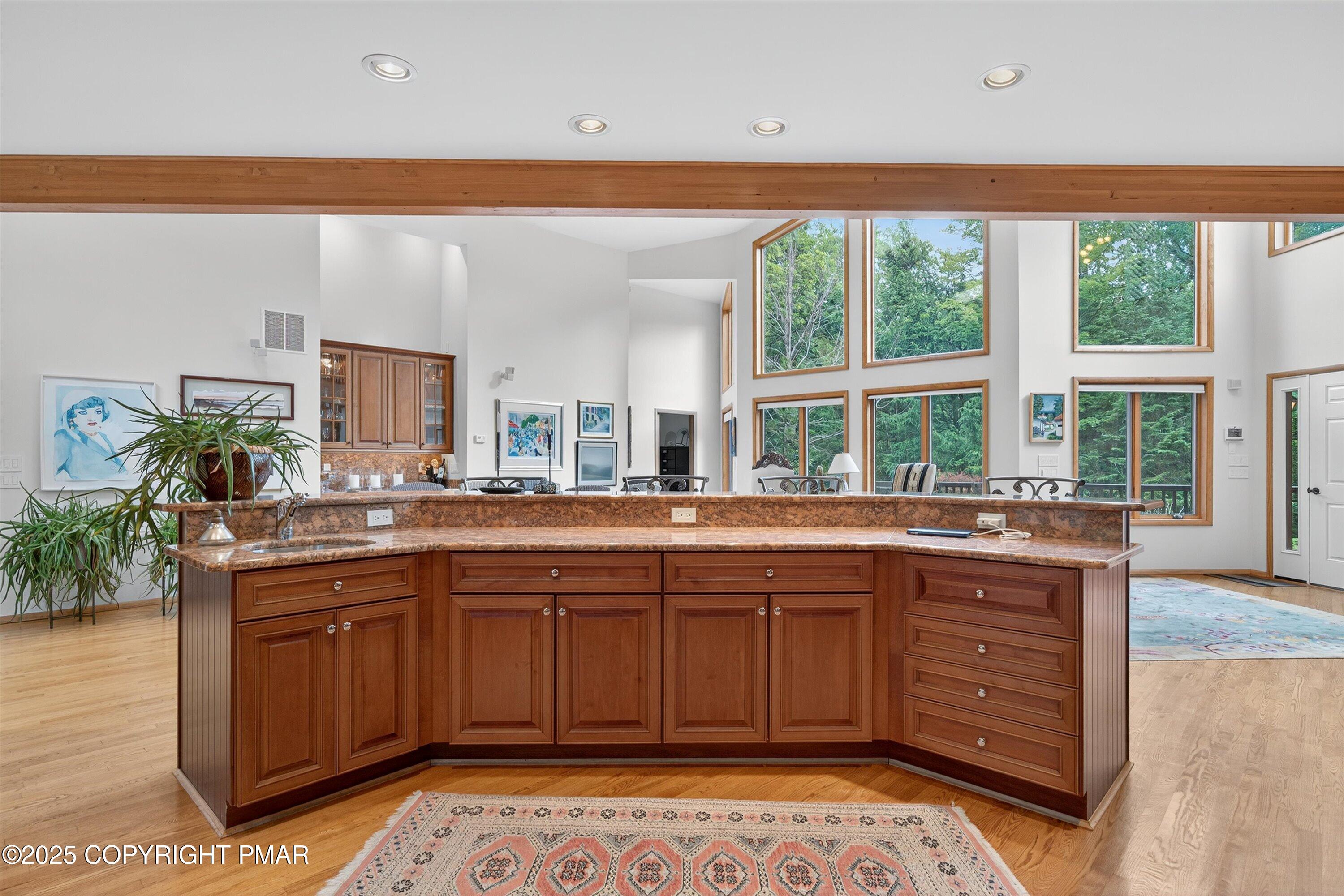 804 Ranch Court Hawley, PA 18428 - Photo 14 of 74 a kitchen with a sink and wooden cabinets