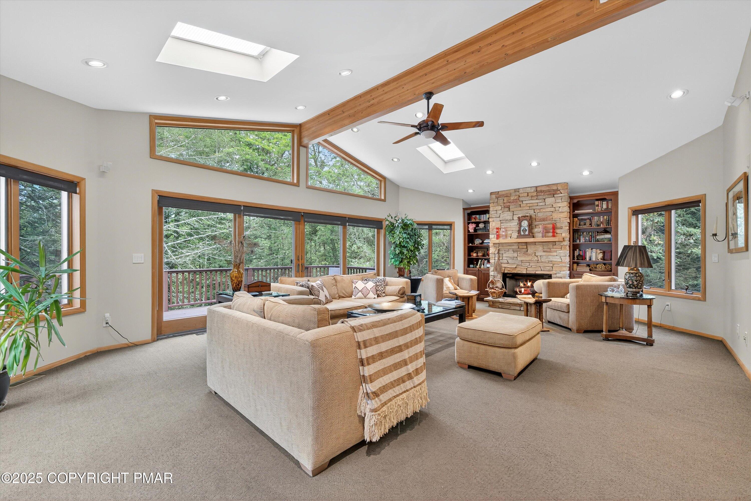 804 Ranch Court Hawley, PA 18428 - Photo 19 of 74 a living room with furniture and large windows