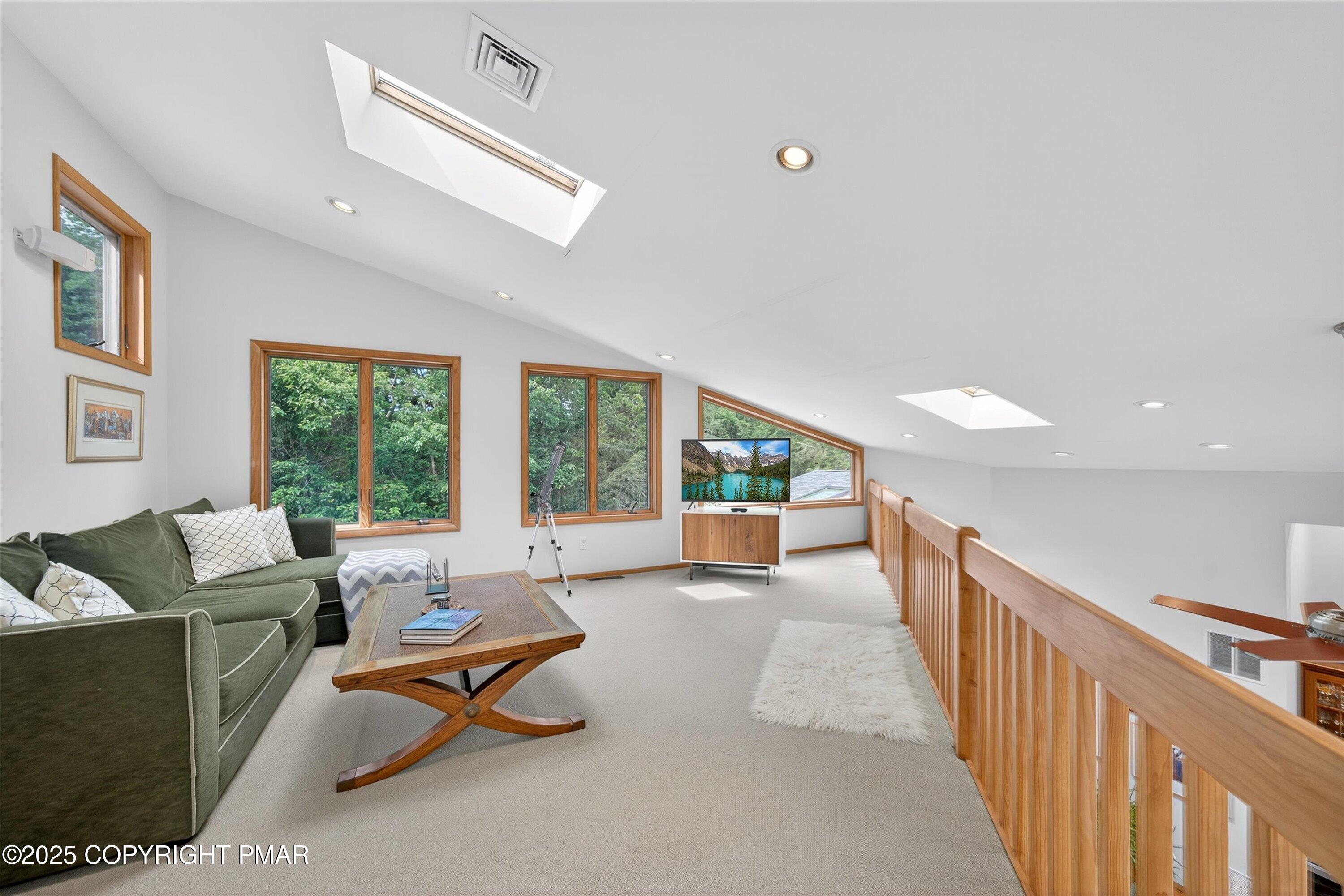 804 Ranch Court Hawley, PA 18428 - Photo 35 of 74 a living room with furniture and a large window