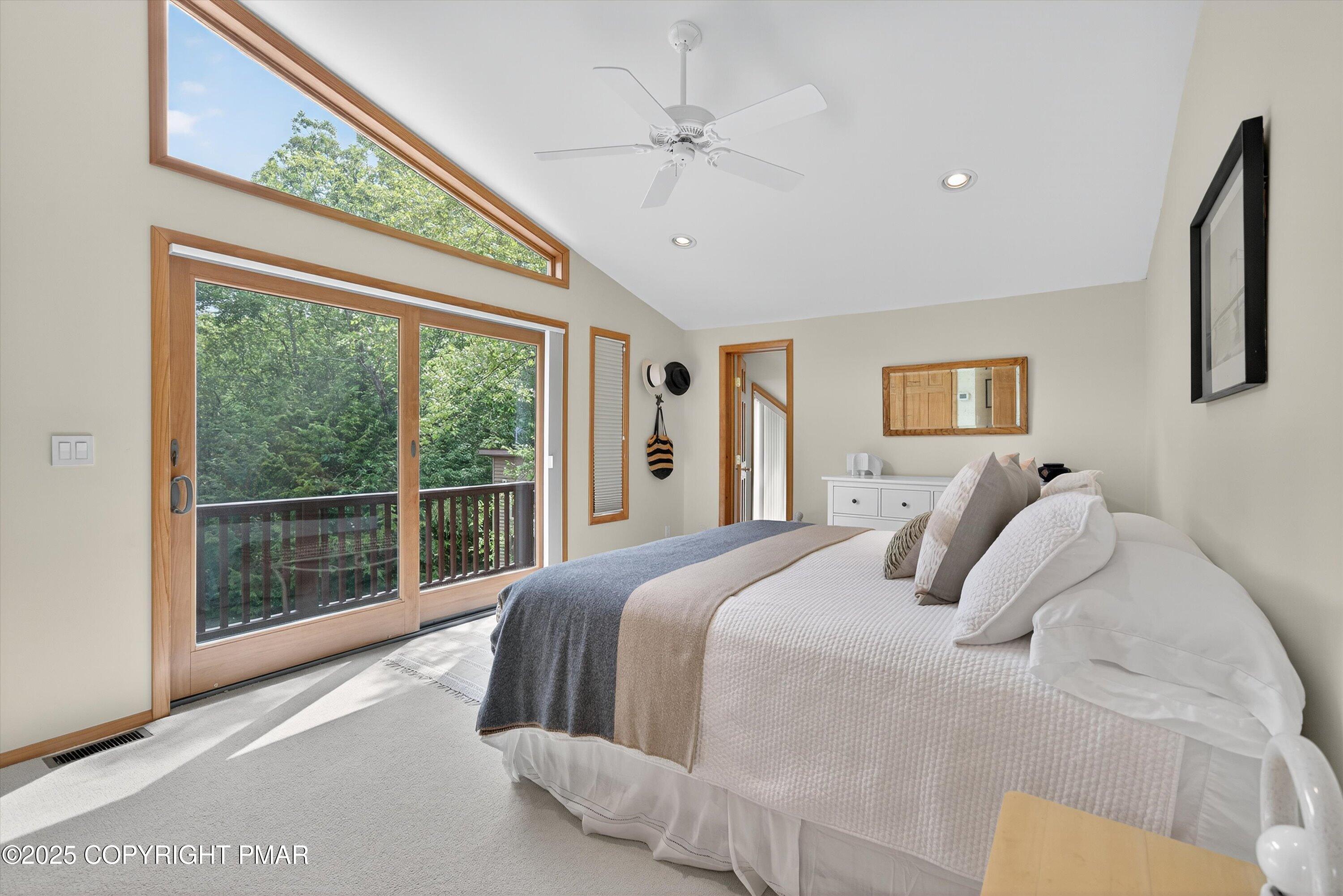 804 Ranch Court Hawley, PA 18428 - Photo 38 of 74 a bedroom with a large bed and a large window