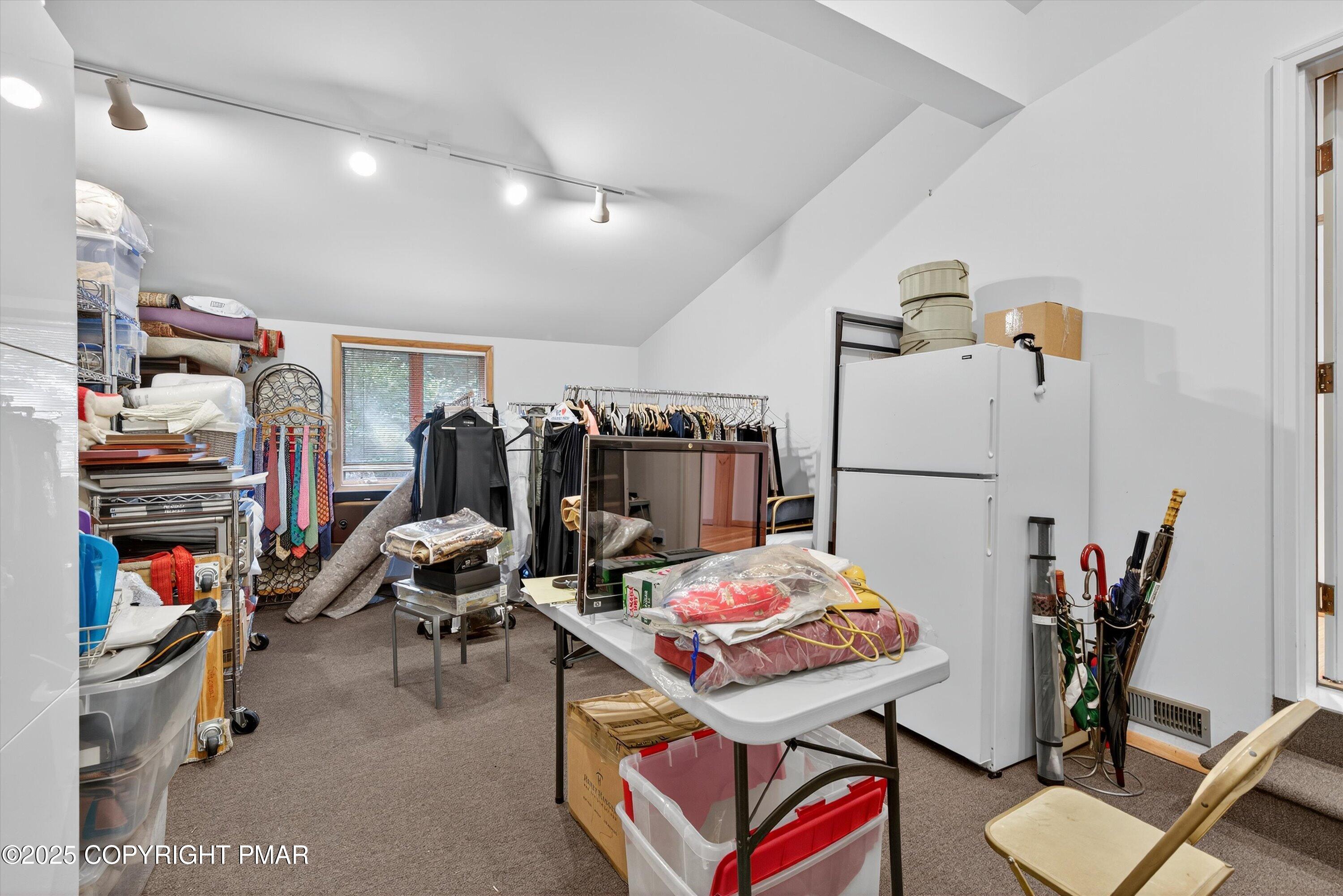 804 Ranch Court Hawley, PA 18428 - Photo 51 of 74 a living room with lots of furniture and gym equipment