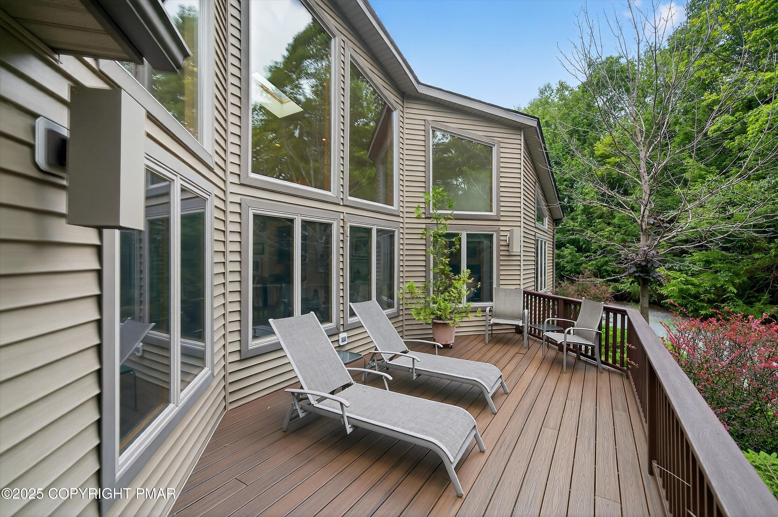 804 Ranch Court Hawley, PA 18428 - Photo 62 of 74 a view of balcony with chairs and wooden fence