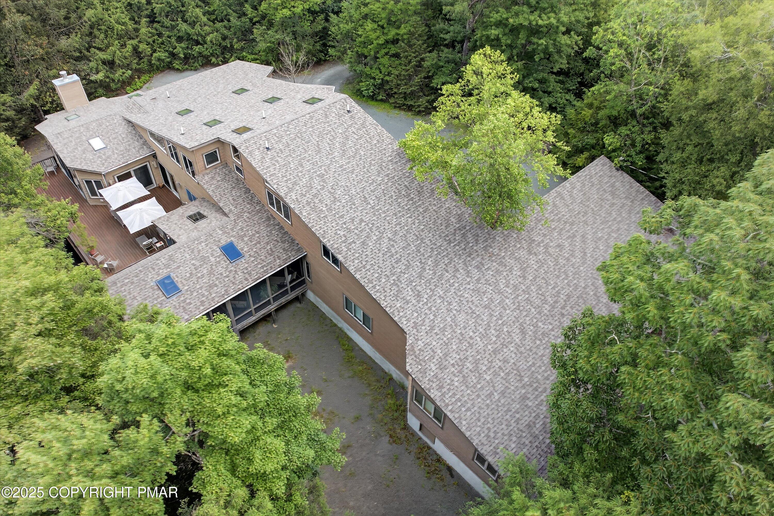 804 Ranch Court Hawley, PA 18428 - Photo 66 of 74 an aerial view of a house with outdoor space and trees all around