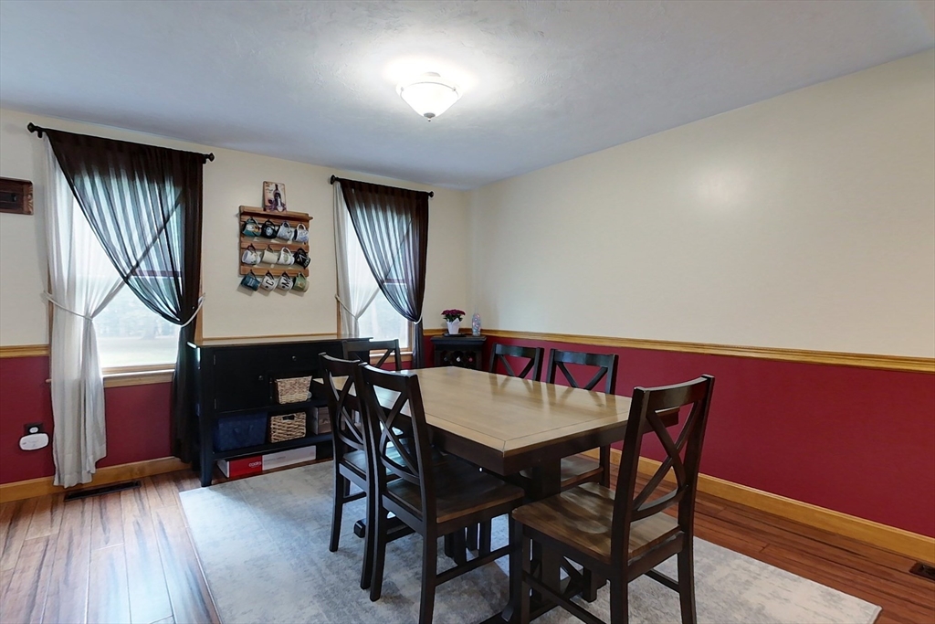 94 Haynes Road Townsend, MA 01469 - Photo 8 of 34 a view of a dining room with furniture and wooden floor
