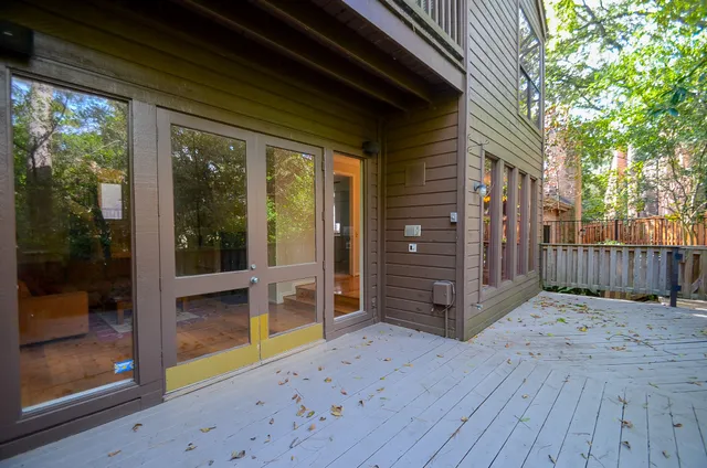a view of front door and wooden floor