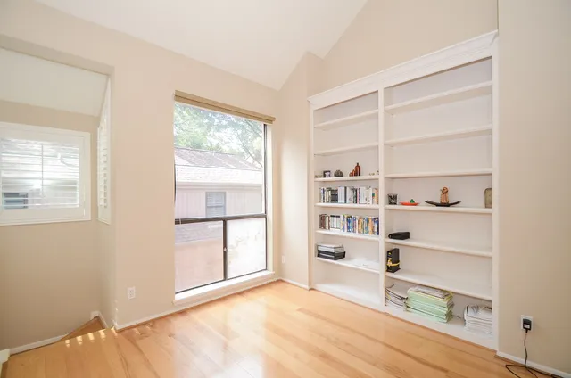 a view of a bedroom with cabinet