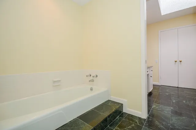 a bathroom with a bathtub