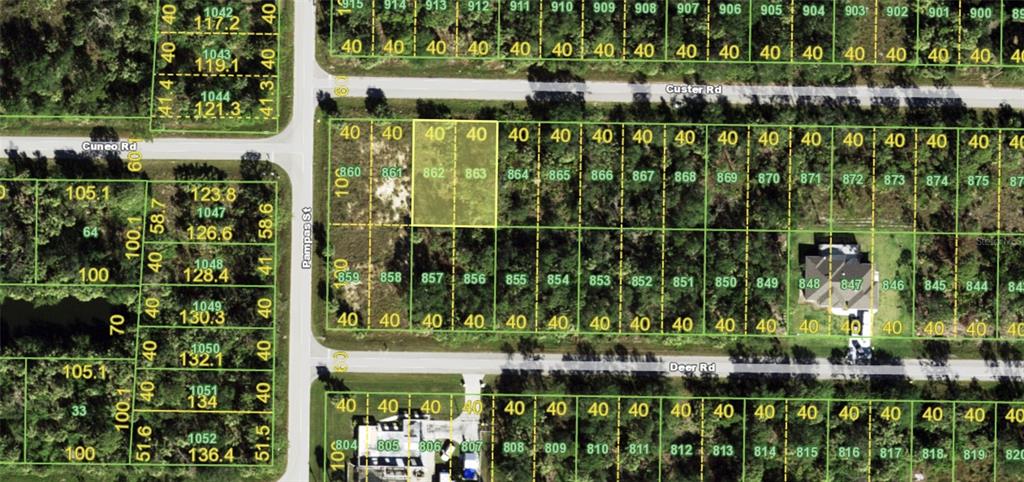 26175 Custer Road Punta Gorda, FL 33955 - Photo 1 of 1 an outdoor view of a building with a lake view