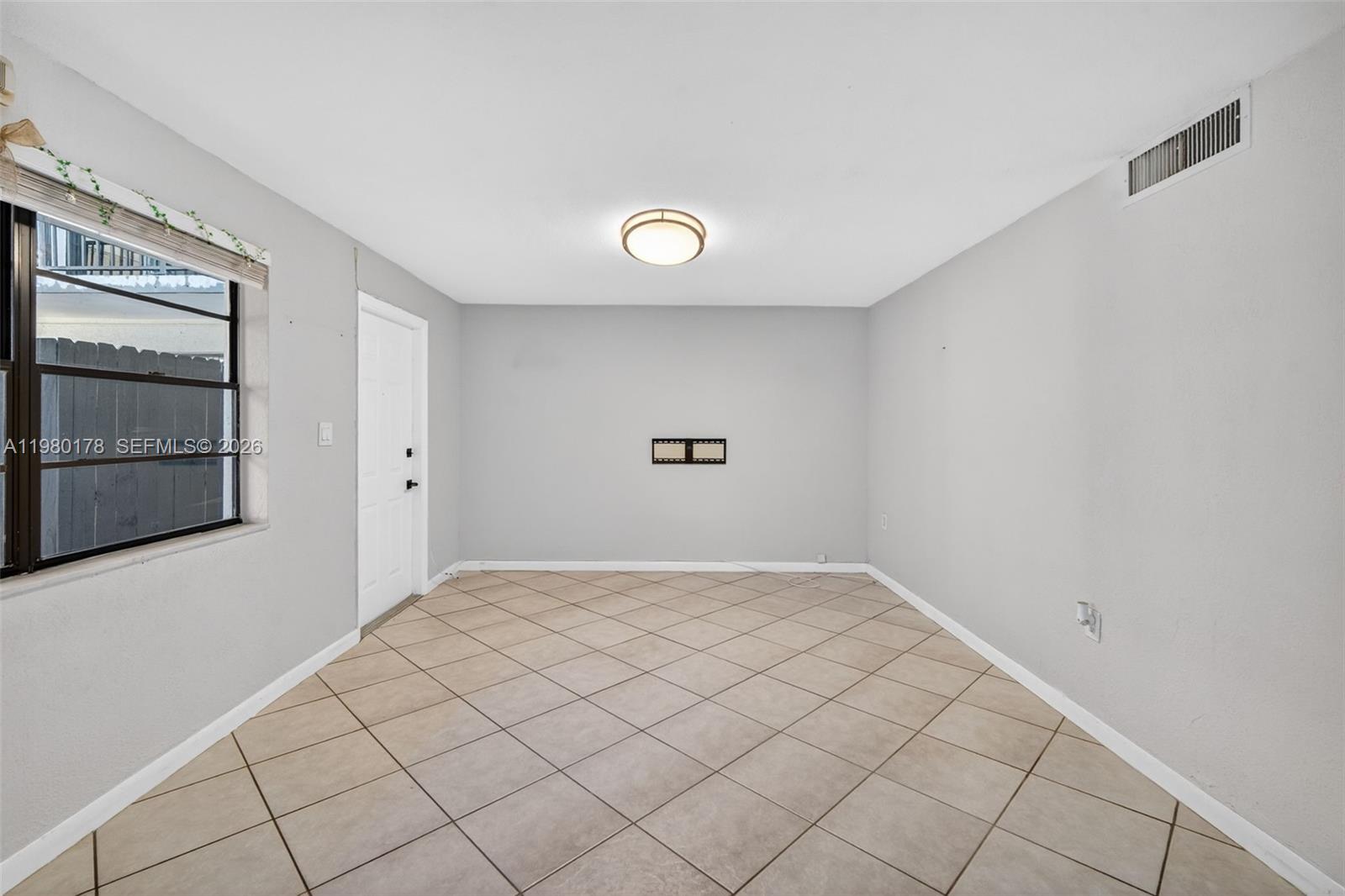 3265 Virginia Street, Unit 9 Miami, FL 33133 - Photo 11 of 32 a view of an empty room