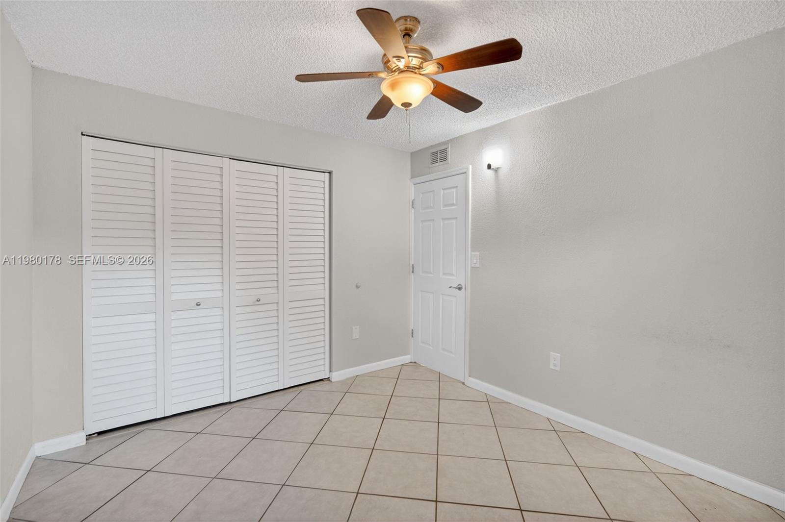 3265 Virginia Street, Unit 9 Miami, FL 33133 - Photo 5 of 32 a view of an empty room