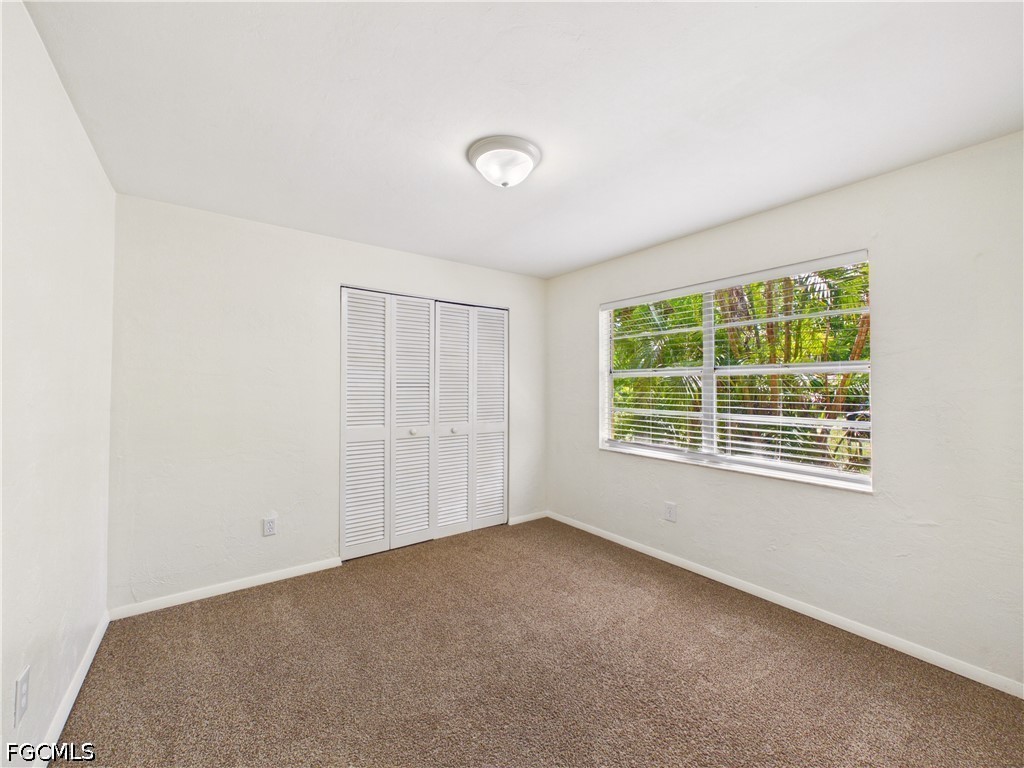 18541 Iris Road Fort Myers, FL 33967 - Photo 9 of 18 an empty room with a window