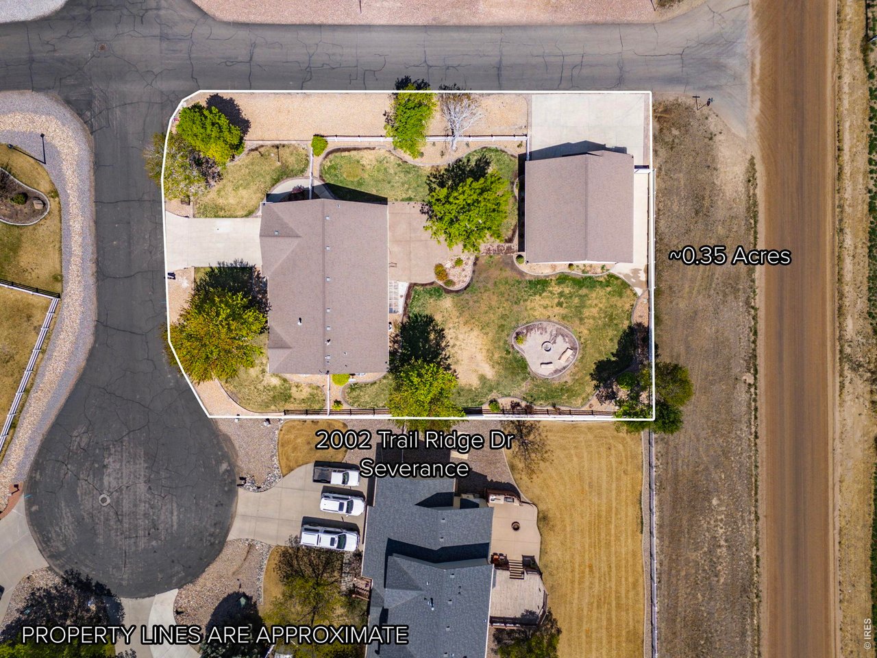 2002 Trail Ridge Drive Severance, CO 80615 - Photo 7 of 49 Situated on a private corner lot in a quiet cul-de-sac, this property backs to farm ground offering a peaceful, tucked-away feeling while still being conveniently close to town and ample amenities.