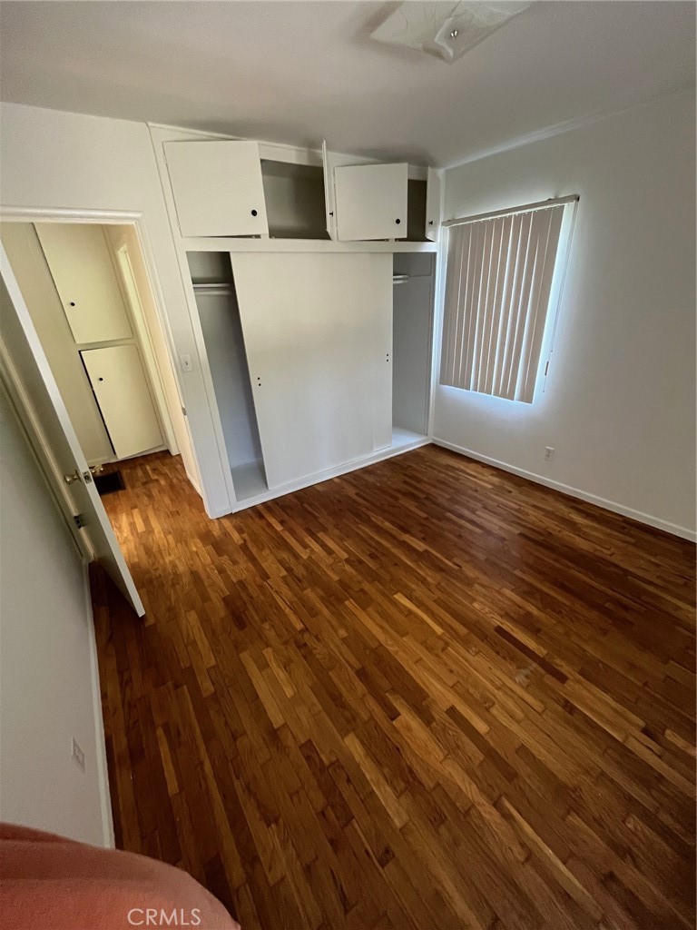 1142 Western Avenue Glendale, CA 91201 - Photo 19 of 23 a view of empty room with wooden floor