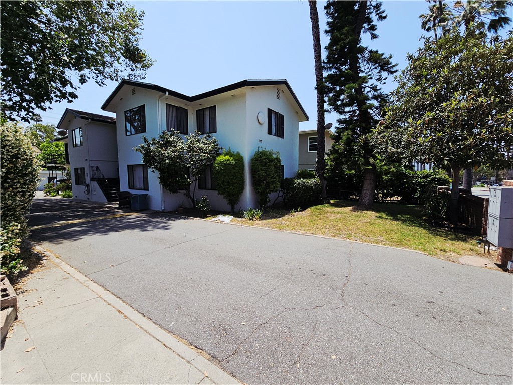 1142 Western Avenue Glendale, CA 91201 - Photo 5 of 23 a view of a house with a yard and large tree