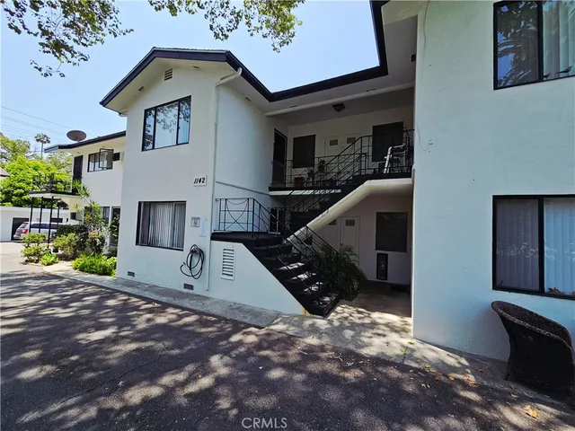 a car park in front of house