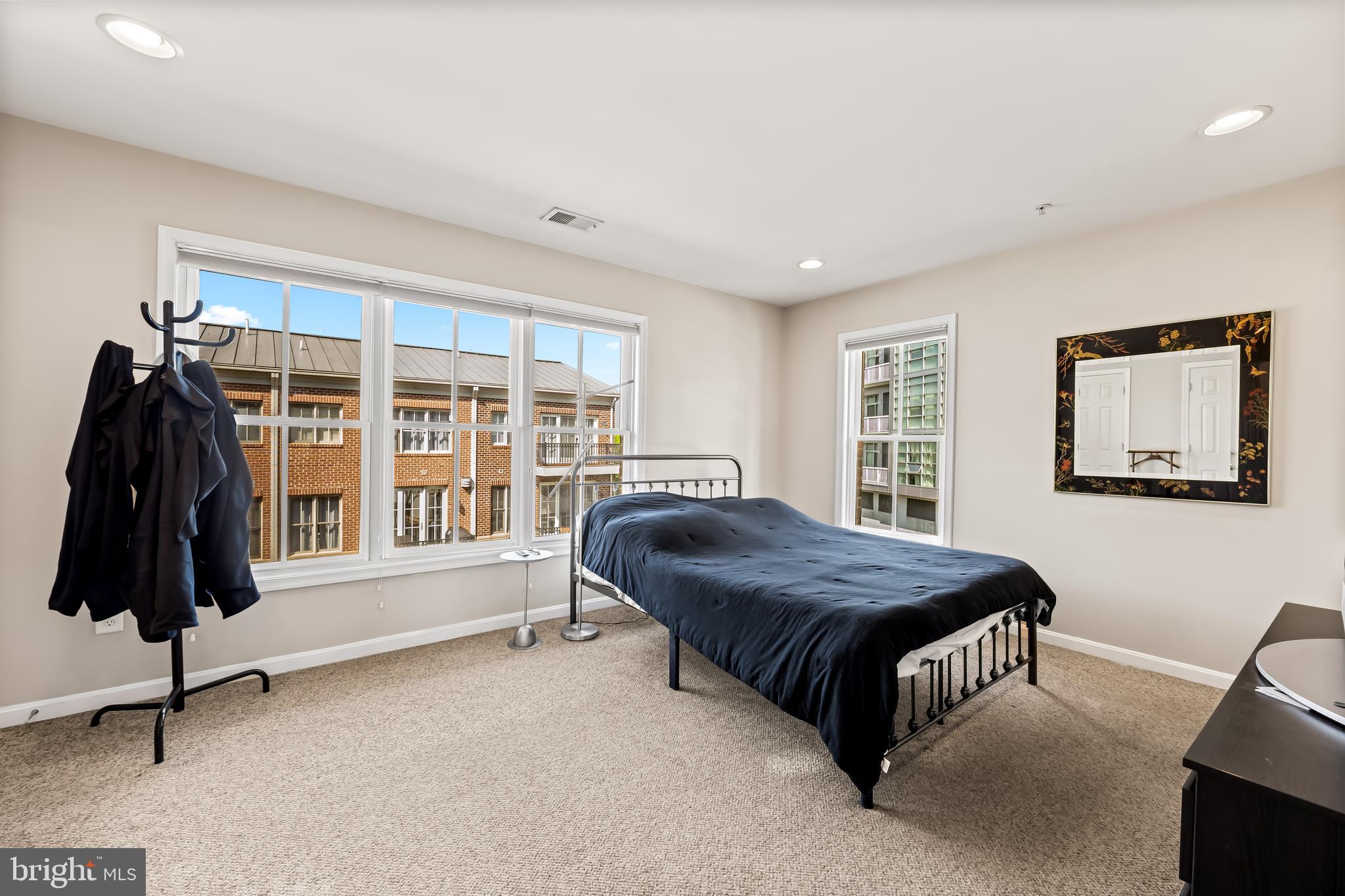 2618 Lighthouse Lane Baltimore, MD 21224 - Photo 23 of 60 a living room with a bed furniture and a window