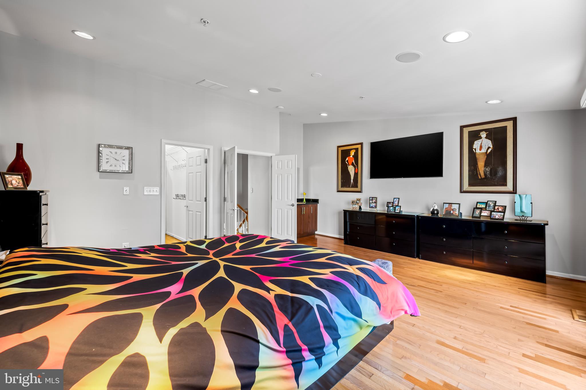 2618 Lighthouse Lane Baltimore, MD 21224 - Photo 33 of 60 a bed room with a bed and a television