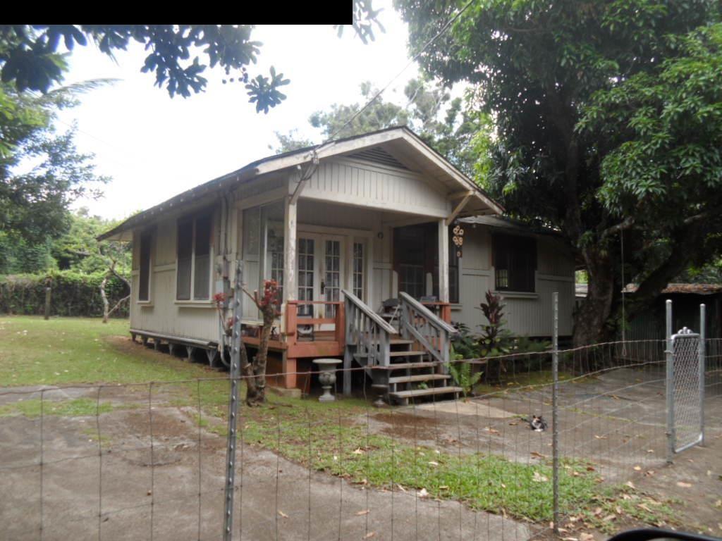 870 Kokomo Road Haiku, HI 96708 - Photo 1 of 3 a view of a house with backyard and porch