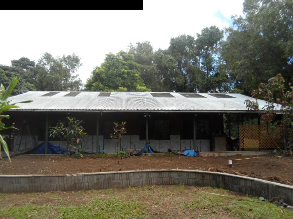 870 Kokomo Road Haiku, HI 96708 - Photo 2 of 3 a view of house with pool table and chairs