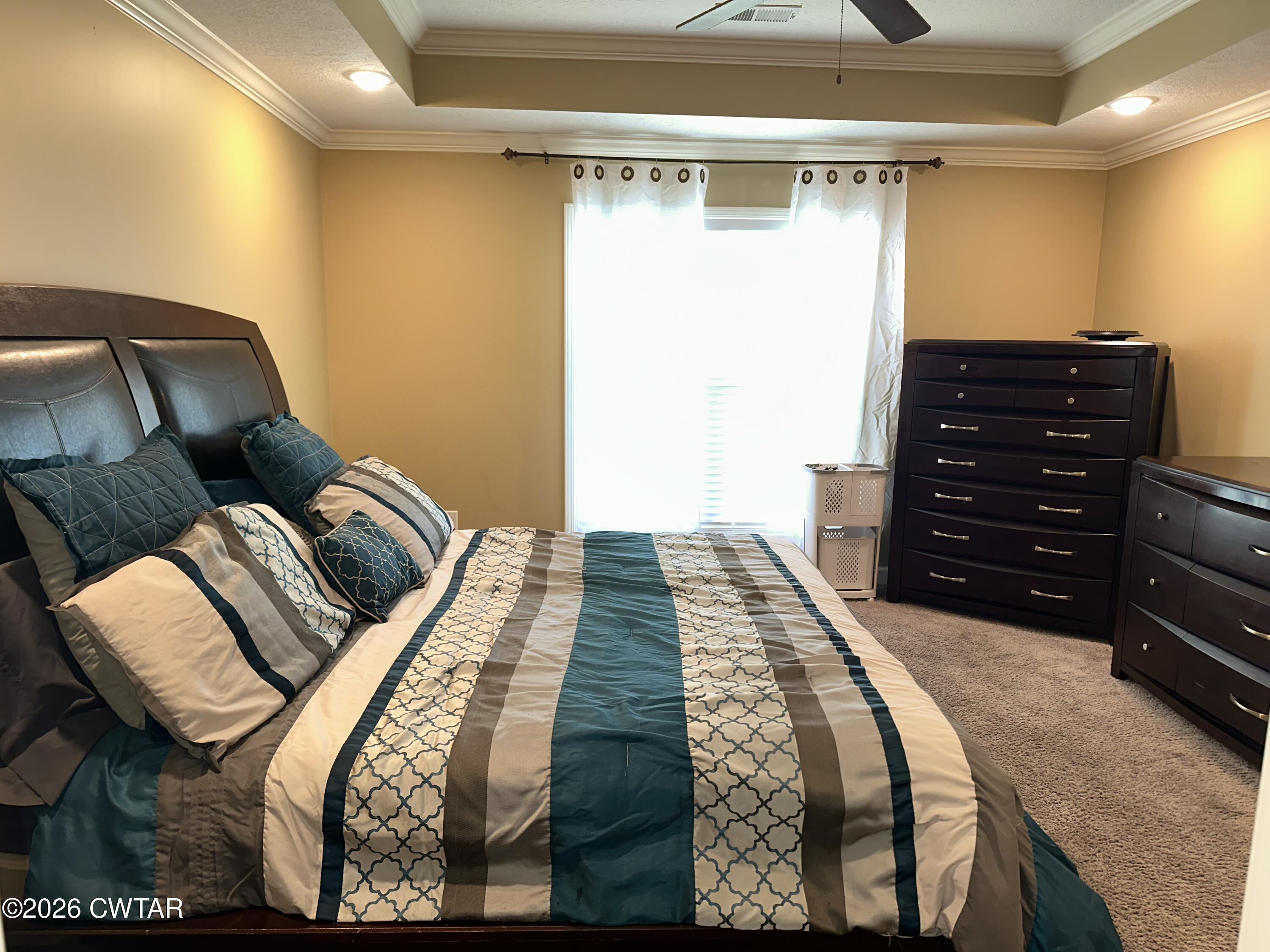 103 Gatewick Drive Jackson, TN 38305 - Photo 12 of 29 a bedroom with a bed and a mirror