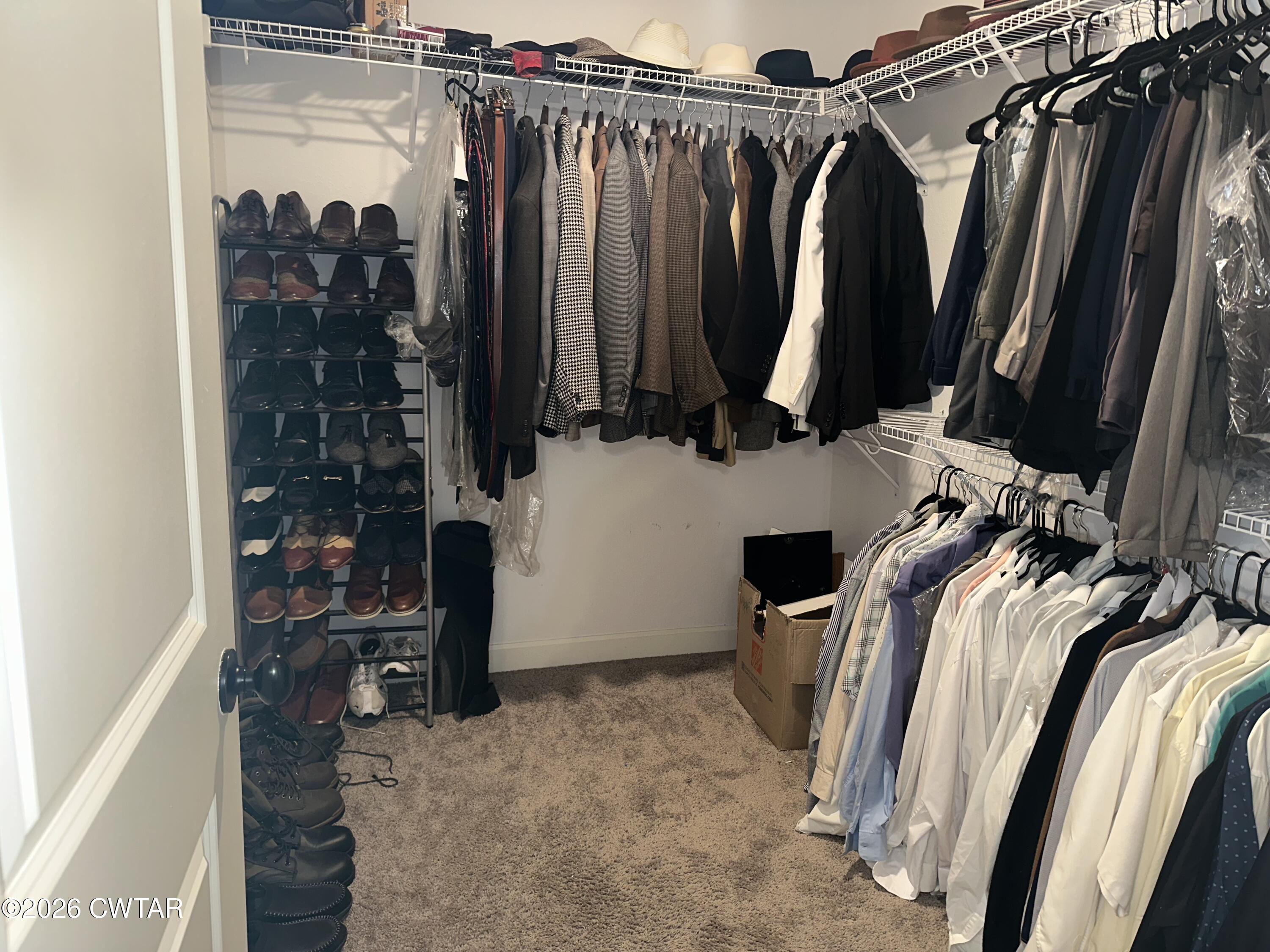103 Gatewick Drive Jackson, TN 38305 - Photo 17 of 29 a view of walk in closet with clothes and shoes