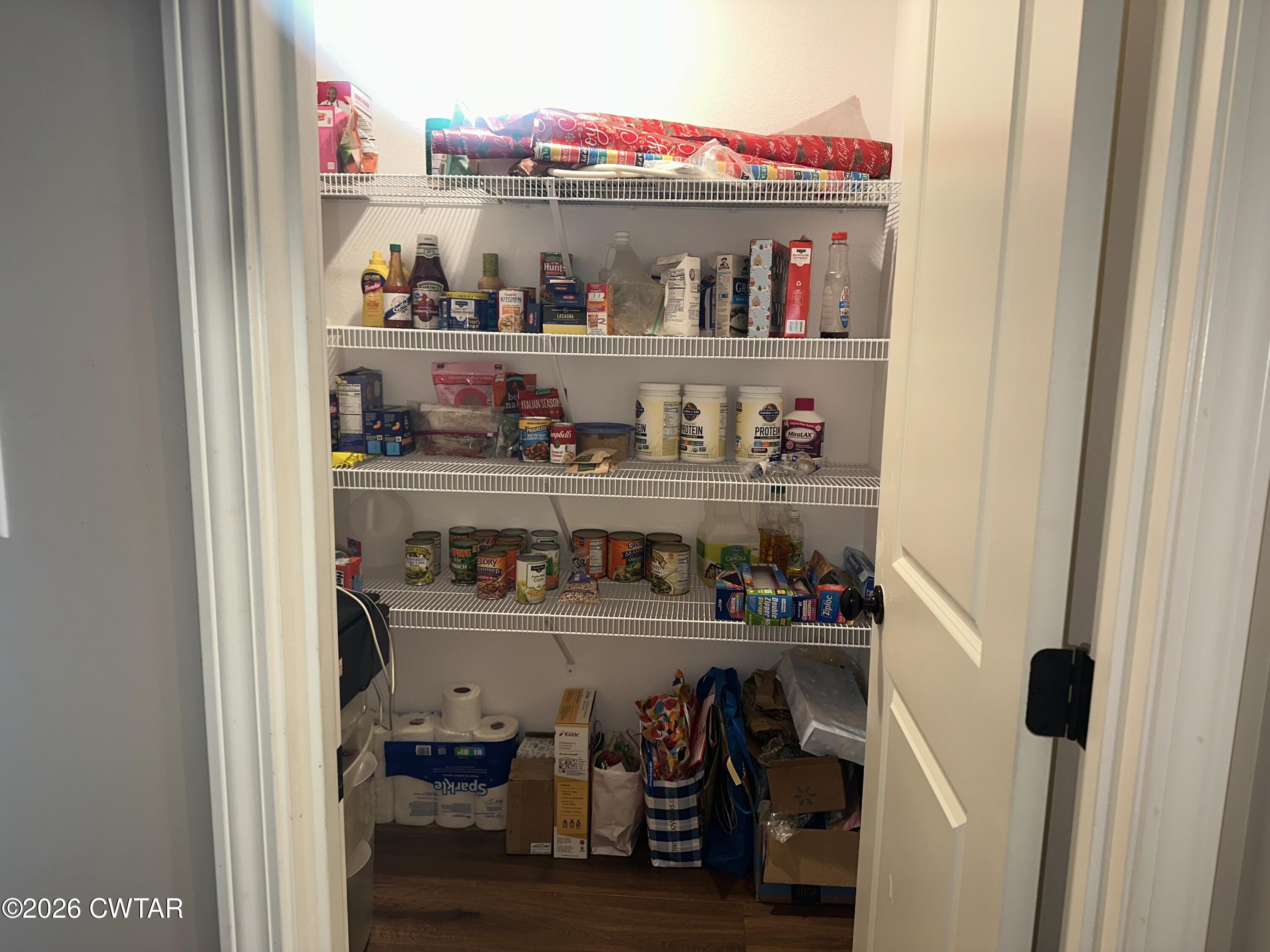 103 Gatewick Drive Jackson, TN 38305 - Photo 22 of 29 a room with wooden shelves