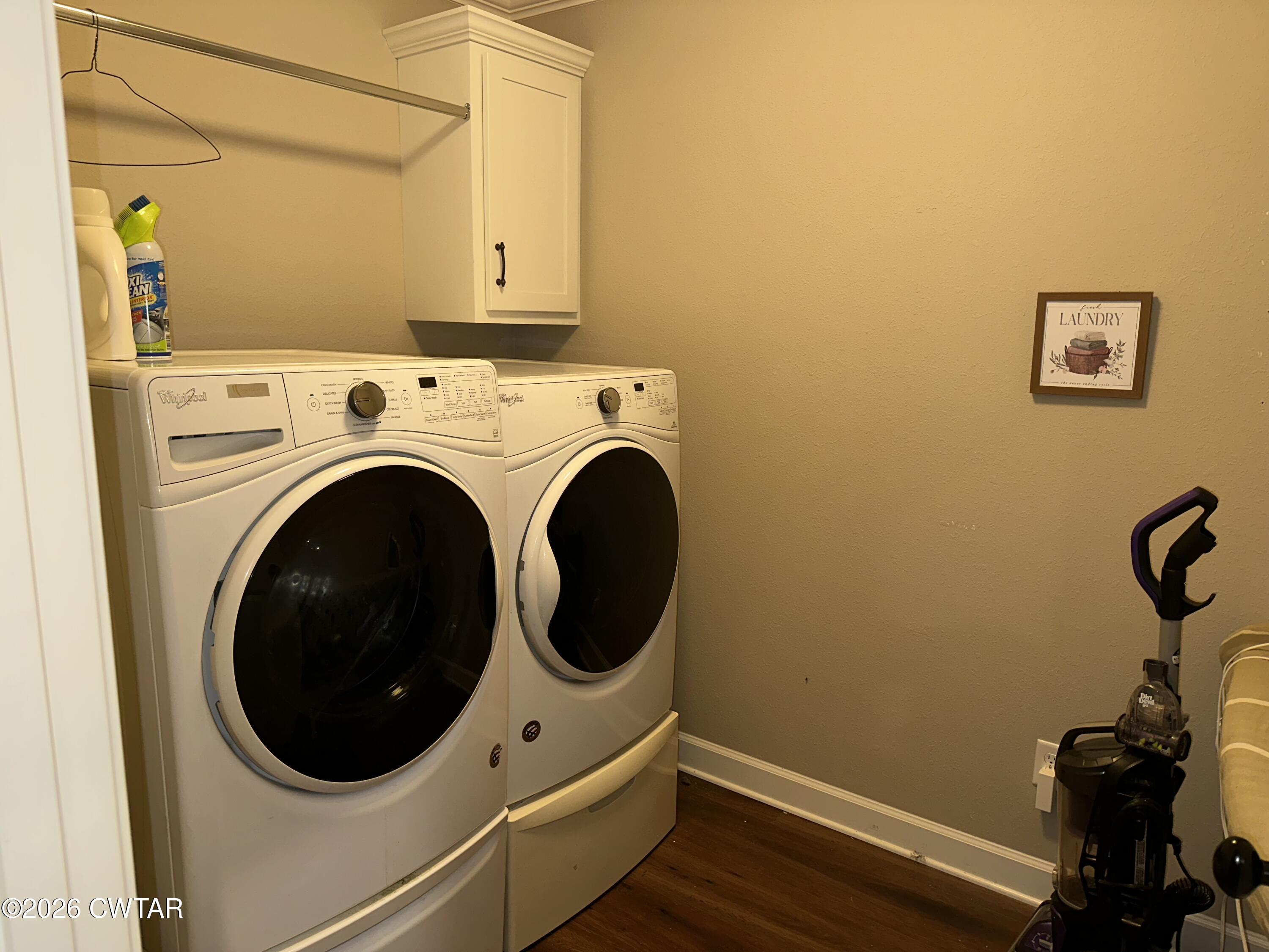 103 Gatewick Drive Jackson, TN 38305 - Photo 24 of 29 a close up view of a storage and utility room with a washer dryer