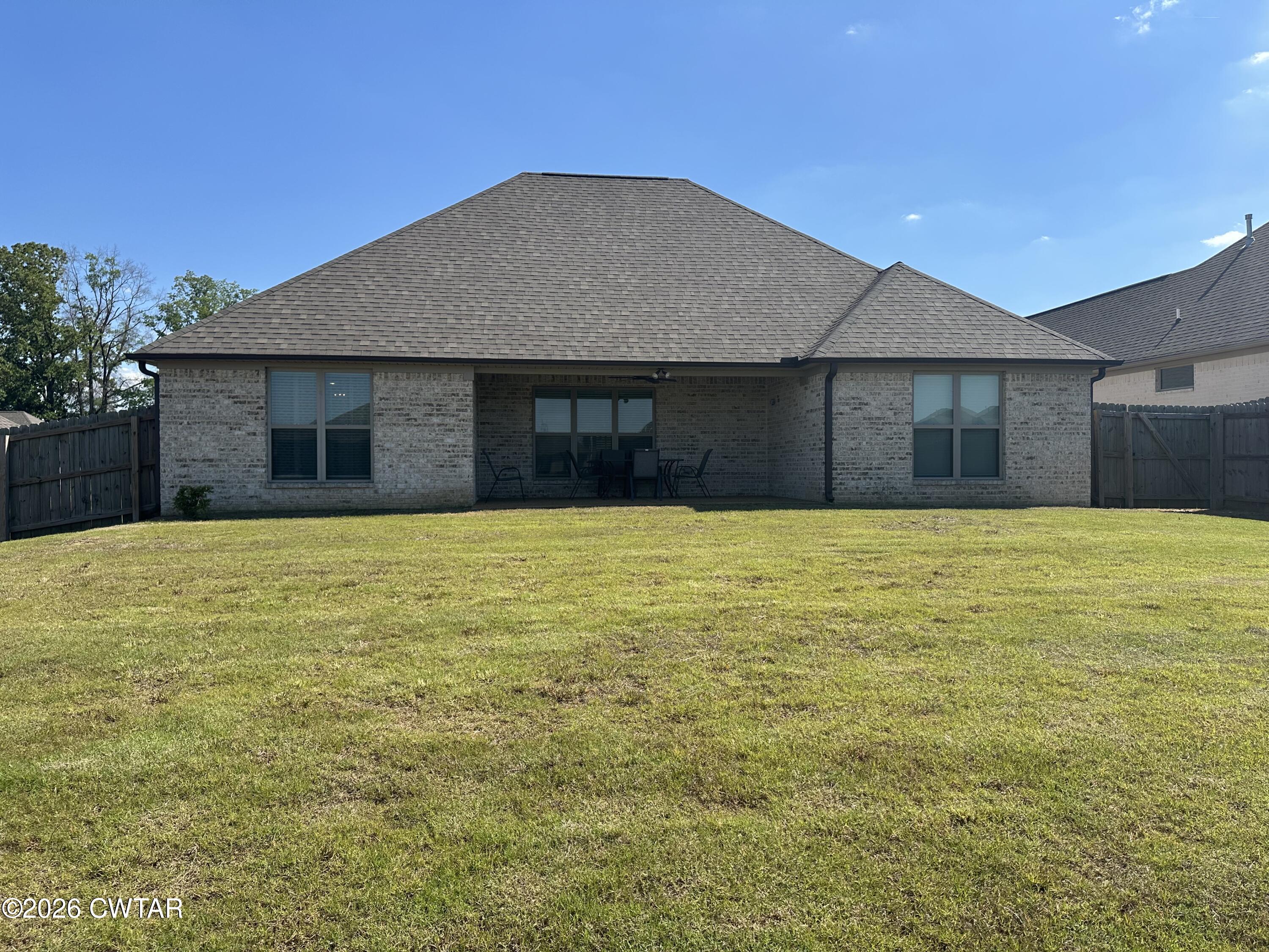 103 Gatewick Drive Jackson, TN 38305 - Photo 29 of 29 a house with swimming pool in front of it
