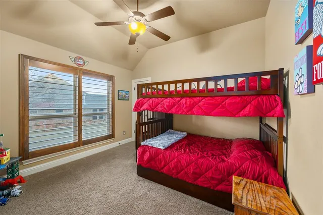 a bed room with a bed and a couch