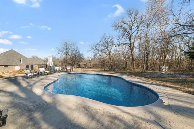 a view of outdoor space yard and swimming pool