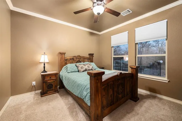 a bed room with a bed and window