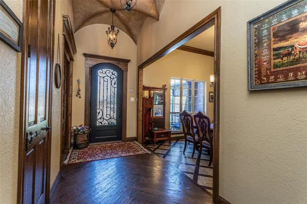 a living room with fireplace furniture and a flat screen tv