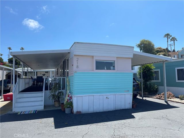 a view of a house with a garage