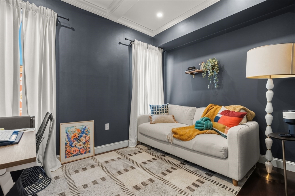 753 East Broadway, Unit 2A Boston, MA 02127 - Photo 11 of 17 a bedroom with a bed and a lamp