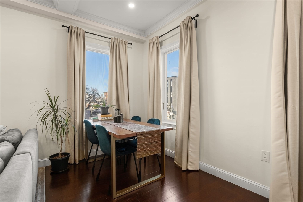753 East Broadway, Unit 2A Boston, MA 02127 - Photo 6 of 17 a view of a livingroom with furniture and window