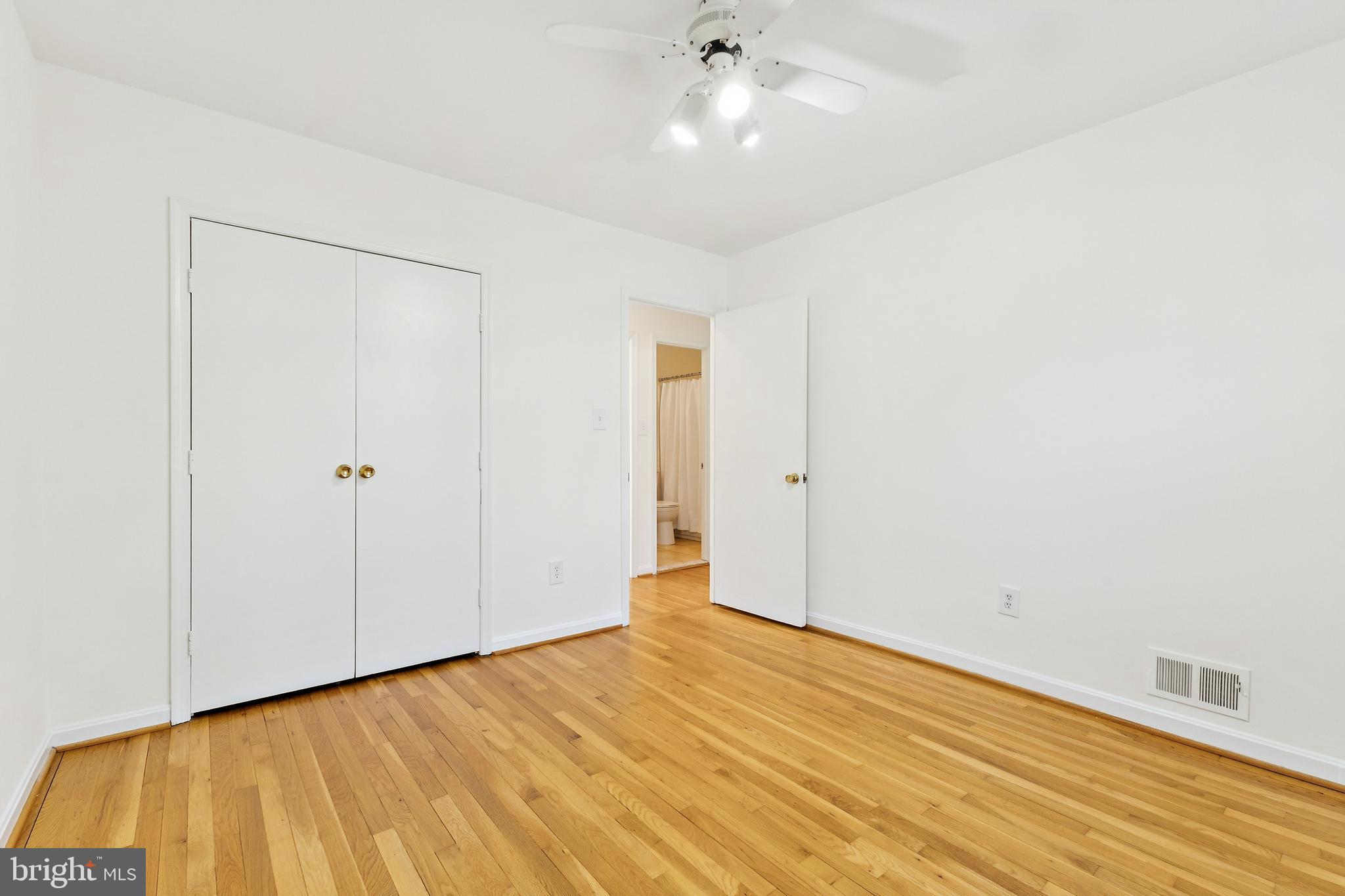 9896 Cardinal Road Fairfax, VA 22030 - Photo 23 of 44 wooden floor in an empty room