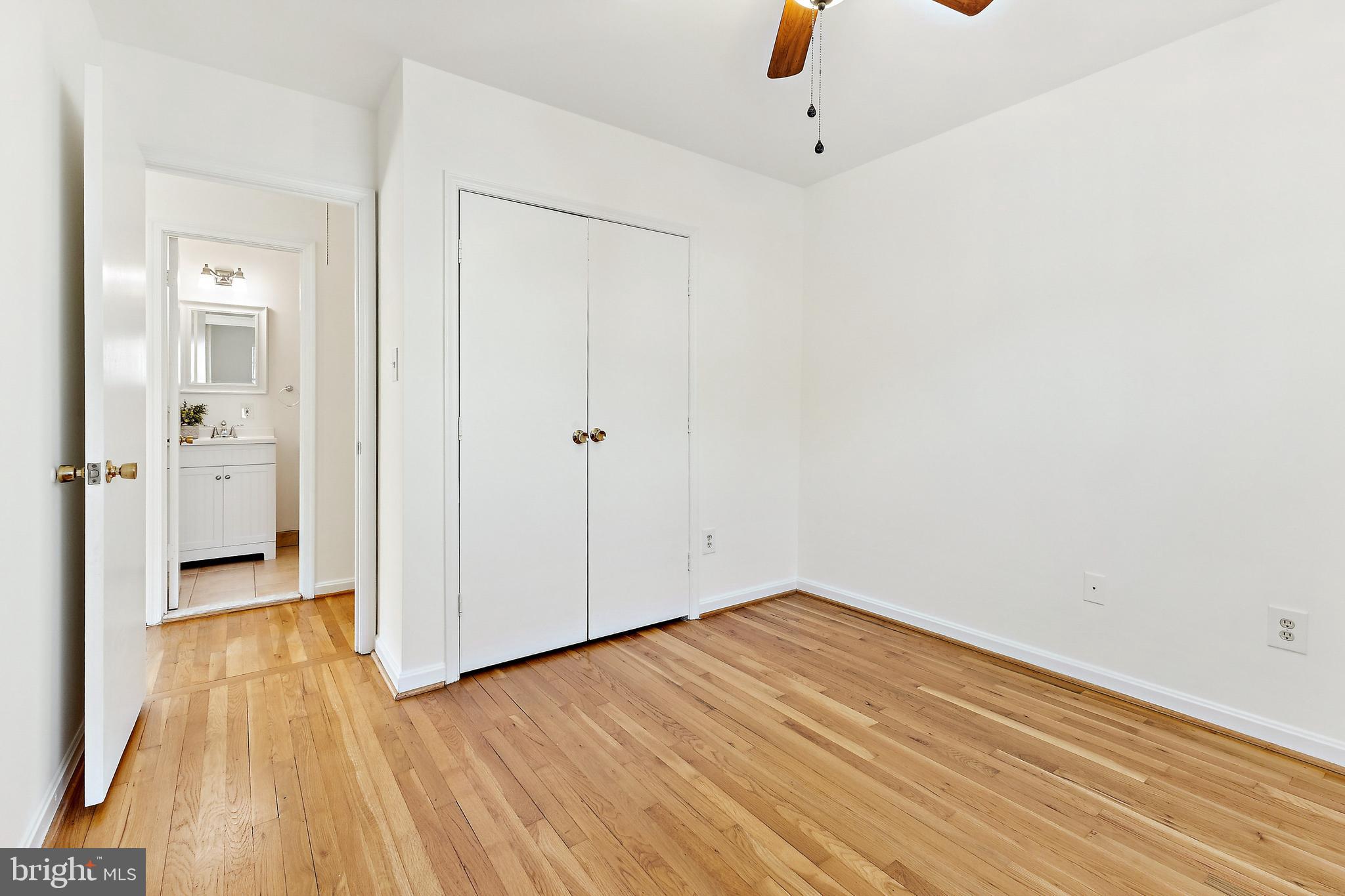 9896 Cardinal Road Fairfax, VA 22030 - Photo 26 of 44 wooden floor in an empty room