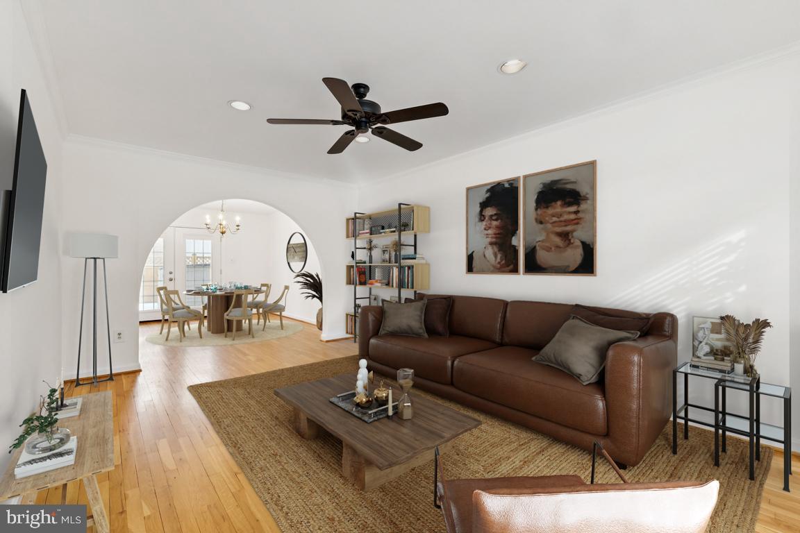 9896 Cardinal Road Fairfax, VA 22030 - Photo 3 of 44 a living room with furniture and a wooden floor