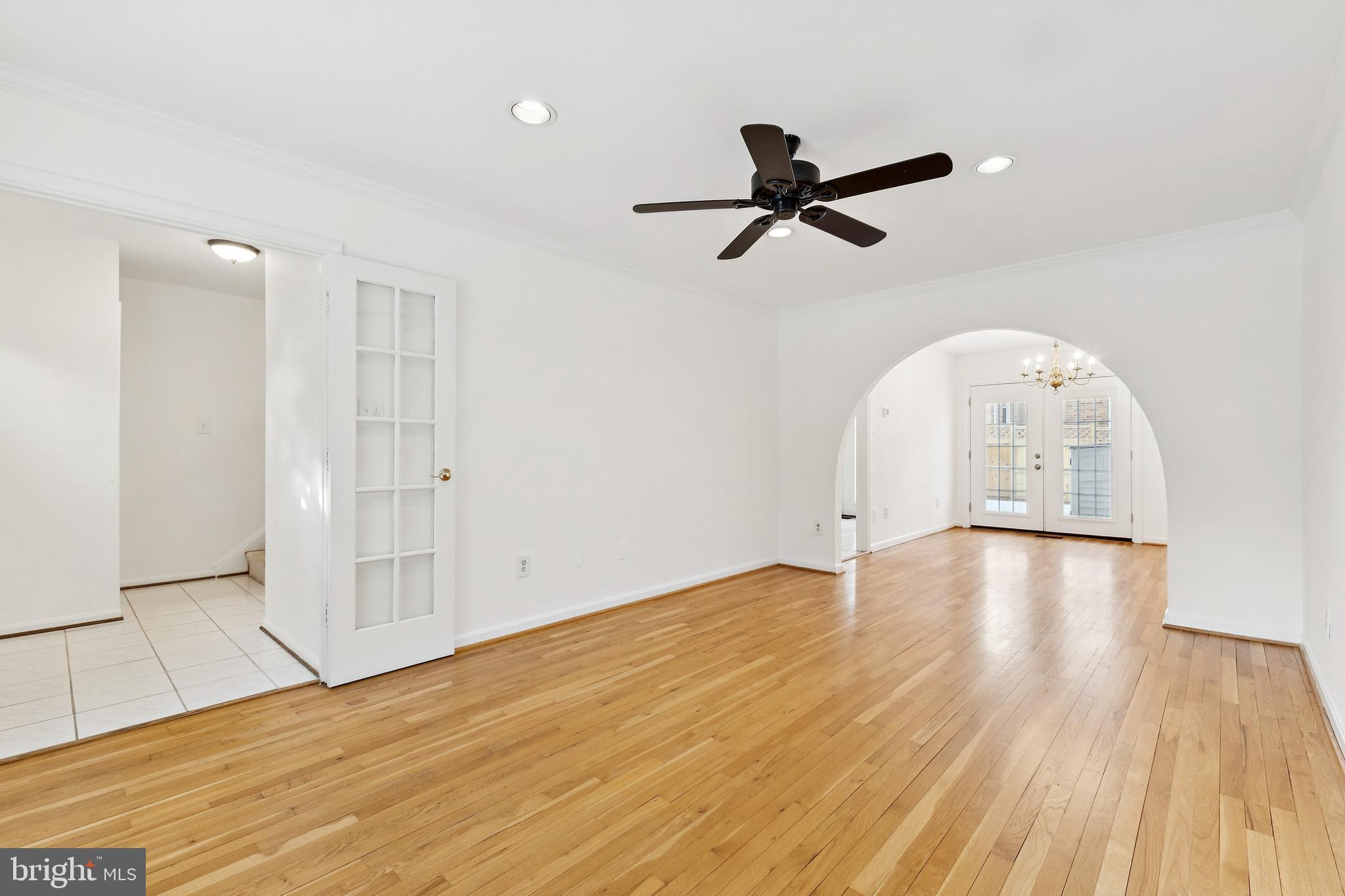 9896 Cardinal Road Fairfax, VA 22030 - Photo 4 of 44 a view of empty room with wooden floor