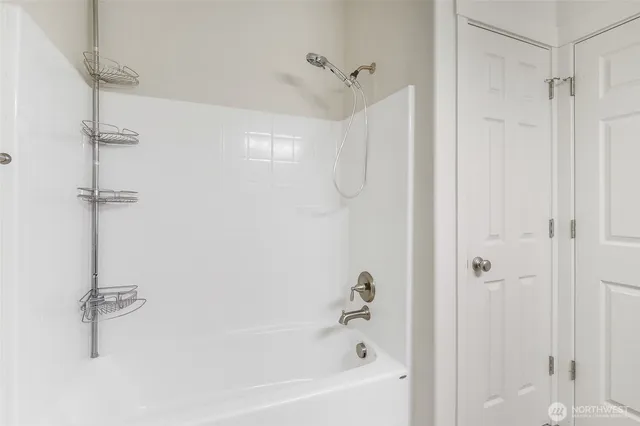 a bathroom with a bathtub