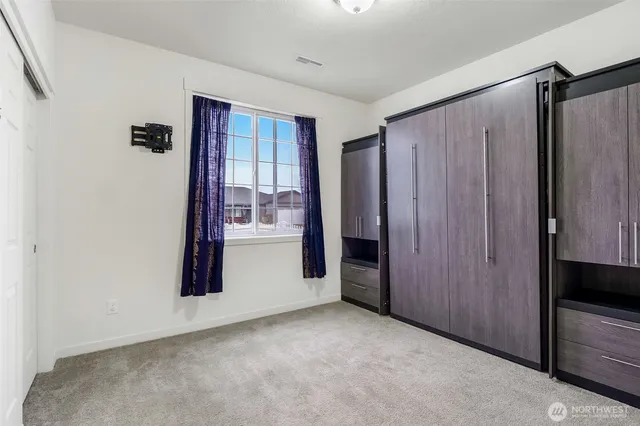 a view of a closet in a room