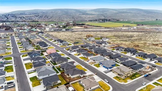 an aerial view of residential building and lake view