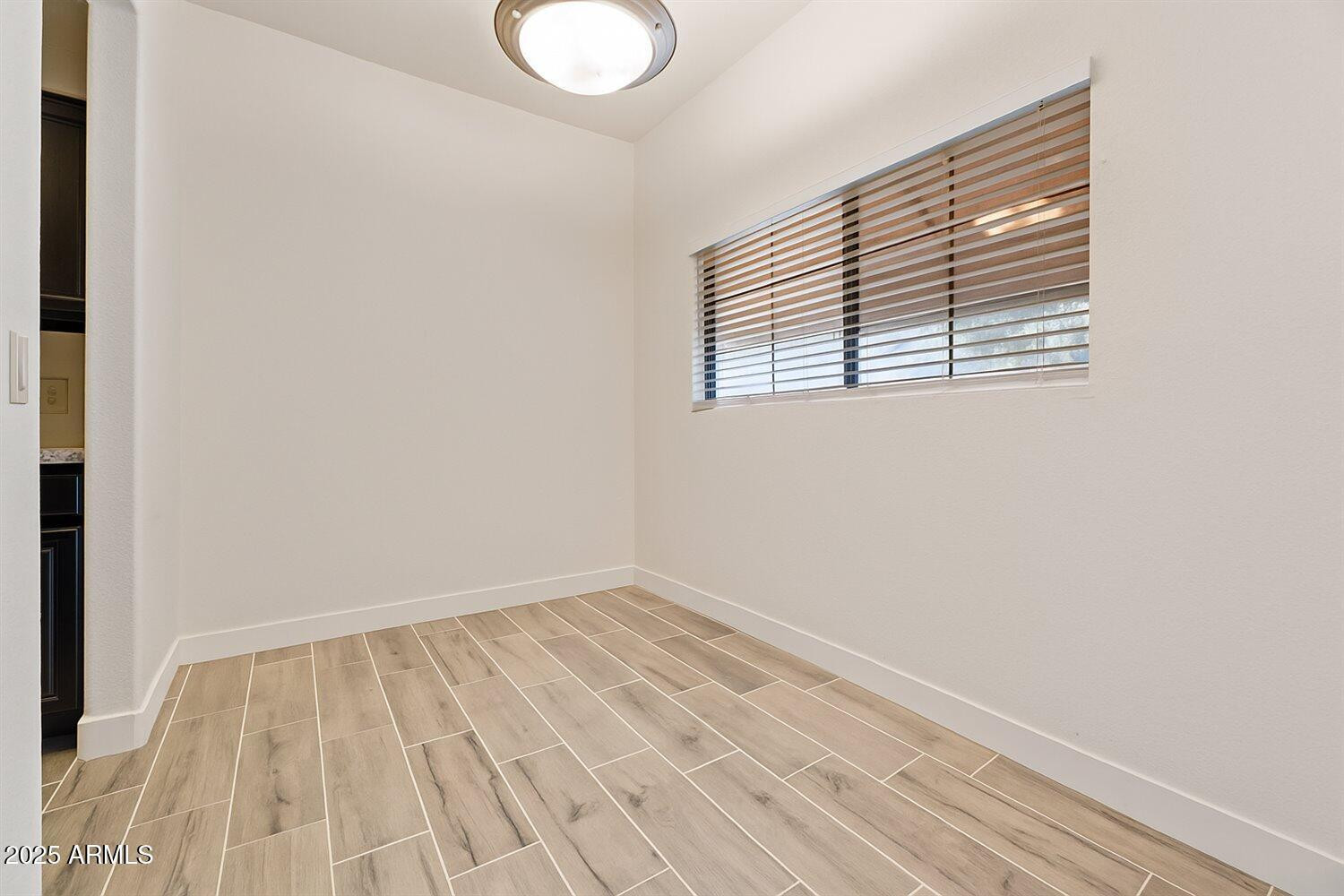 3434 East Baseline Road, Unit 260 Phoenix, AZ 85042 - Photo 11 of 19 a view of a room that has a window in it