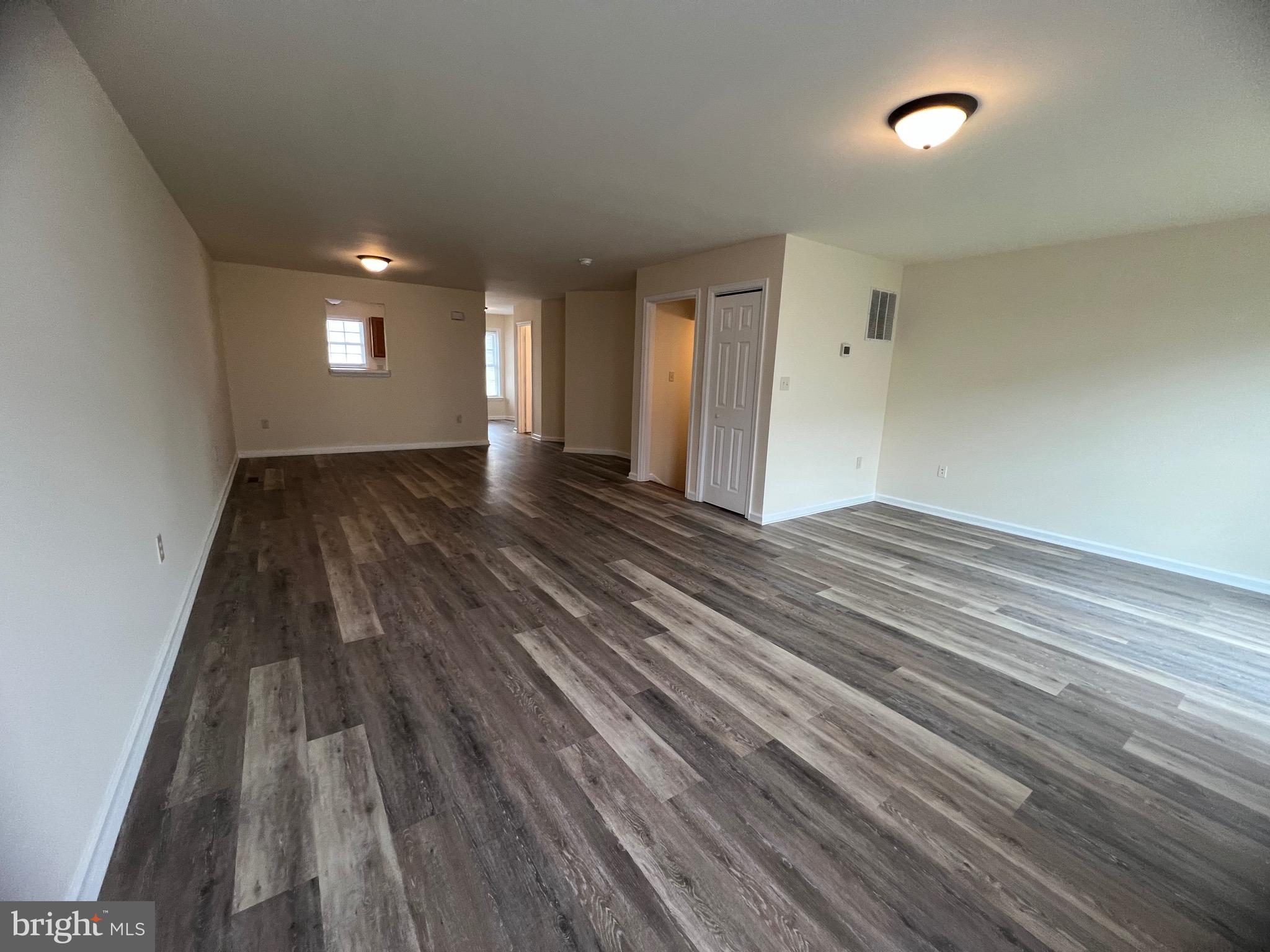 15 Mistala Court Inwood, WV 25428 - Photo 11 of 35 a view of a room with wooden floor and window