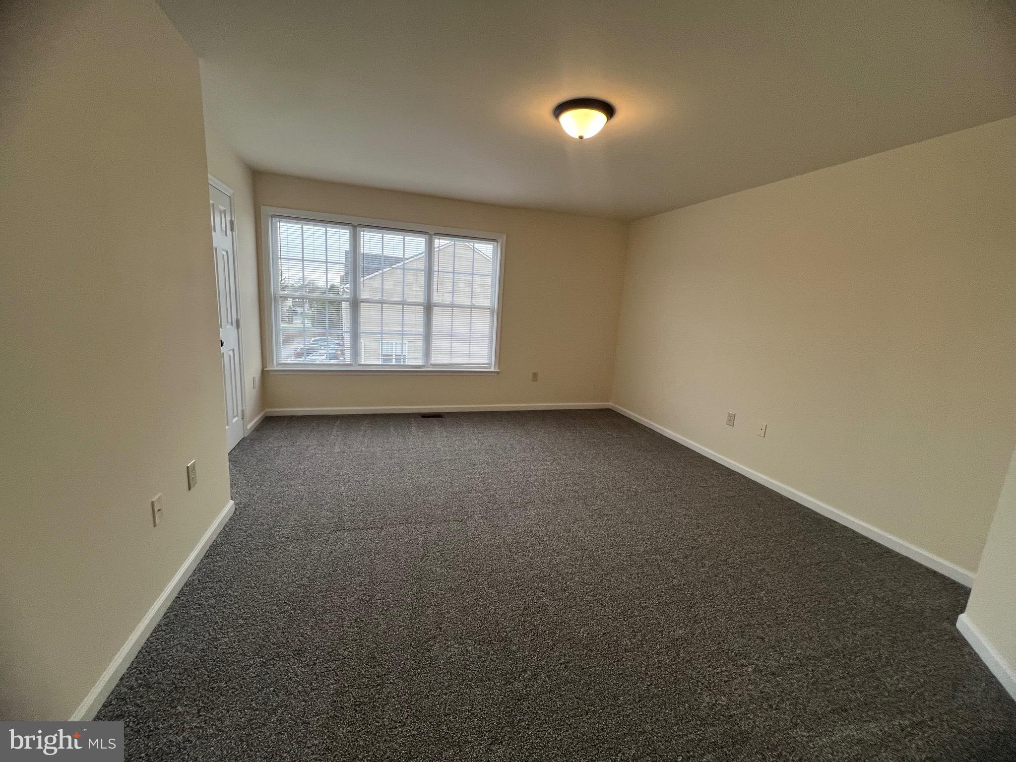 15 Mistala Court Inwood, WV 25428 - Photo 22 of 35 an empty room with a empty space and windows